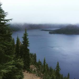 I visited Crater Lake, Oregon last week. It was beautiful, but dense fog and smoke from forest fires enveloped the mountain tops.